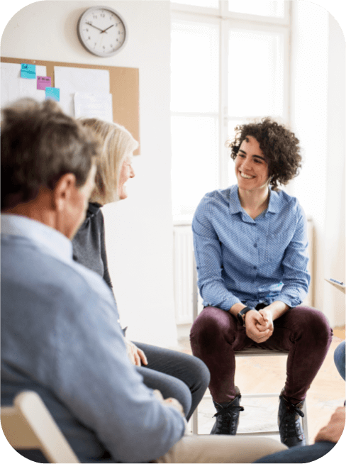 Women share in a group therapy session through GHA's mobile crisis unit